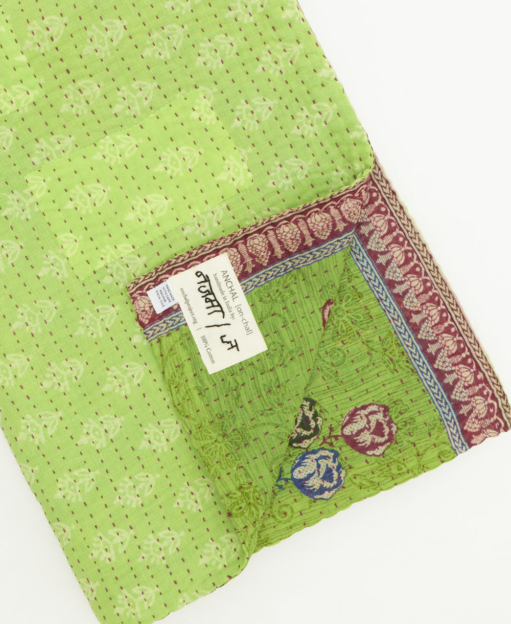 kantha quilt throw featuring traditional kantha hand stitching
