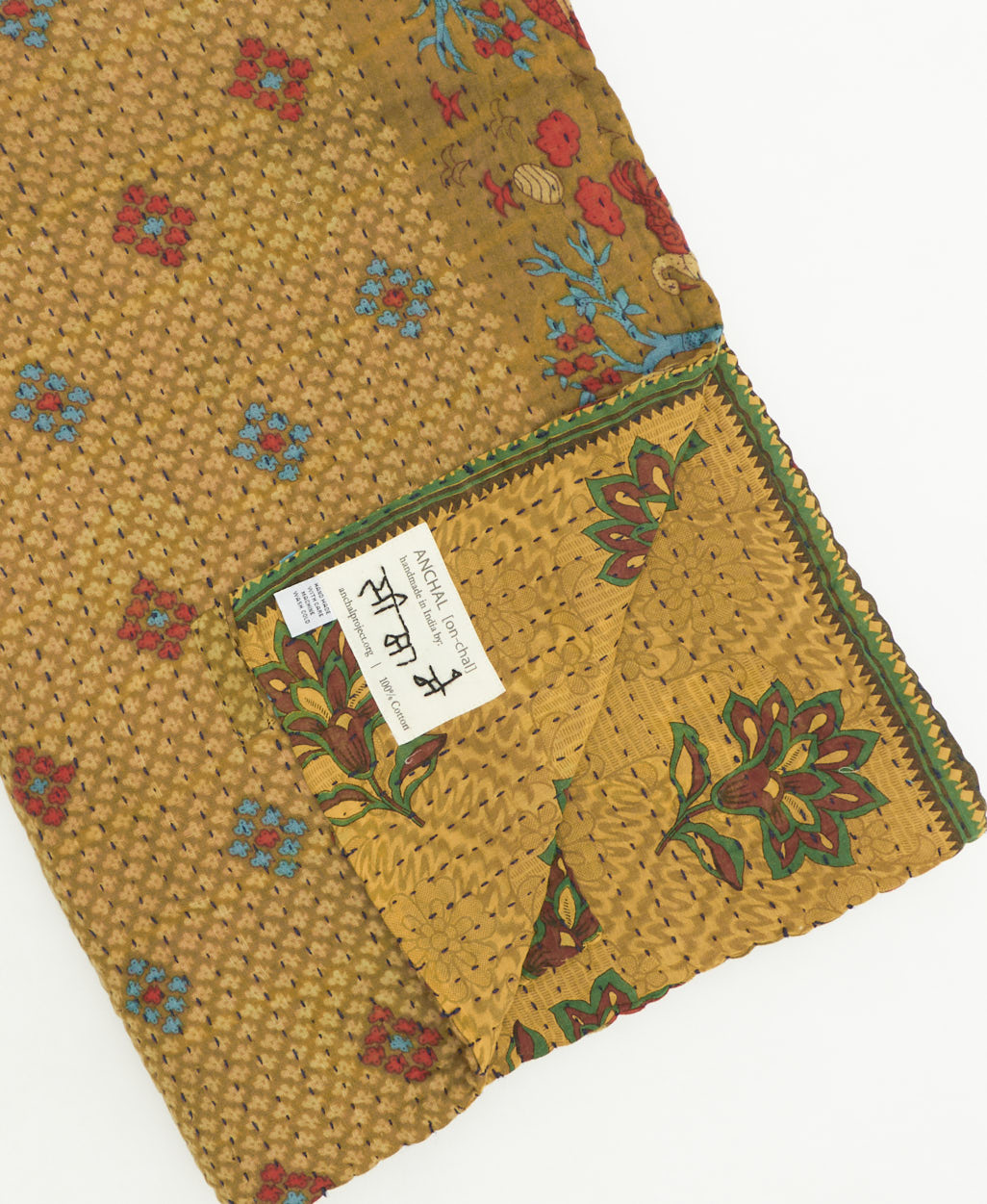 kantha quilt throw featuring traditional kantha hand stitching