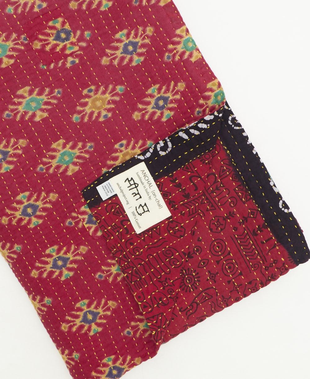kantha quilt throw featuring traditional kantha hand stitching