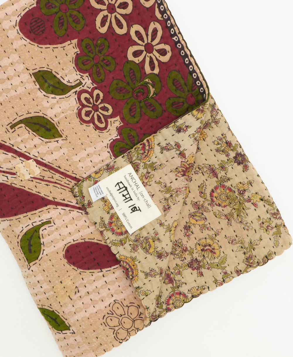 kantha quilt throw featuring traditional kantha hand stitching