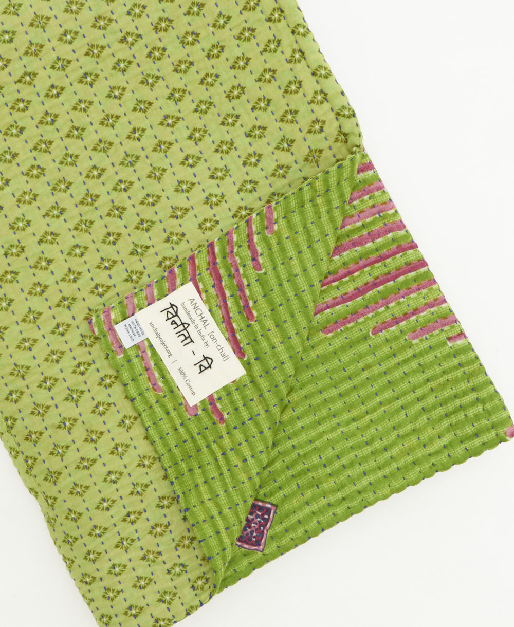 kantha quilt throw featuring traditional kantha hand stitching