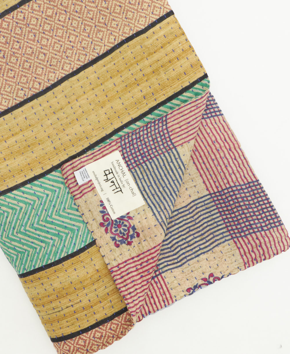 kantha quilt throw featuring traditional kantha hand stitching