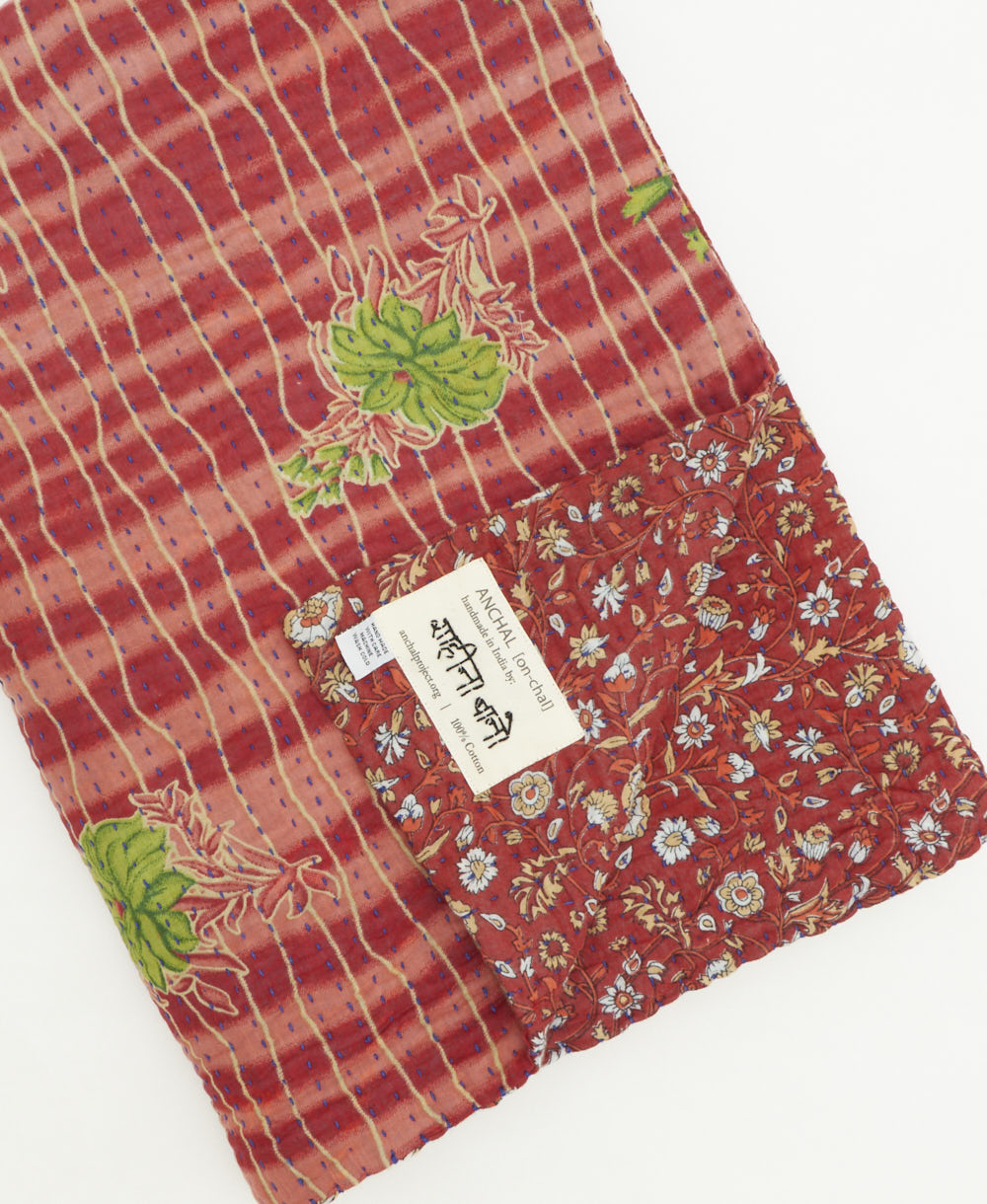 kantha quilt throw featuring traditional kantha hand stitching