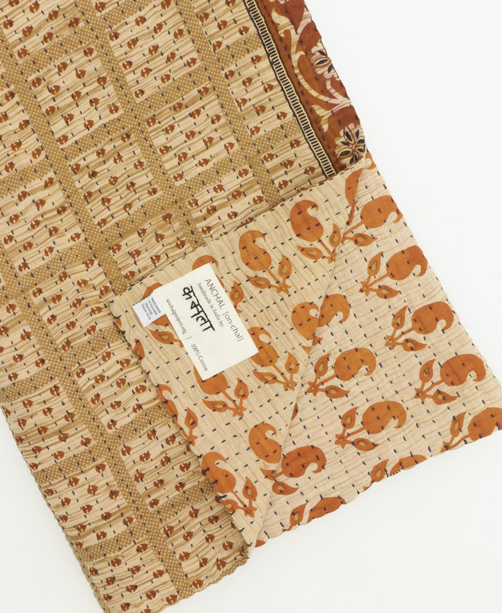 kantha quilt throw featuring traditional kantha hand stitching