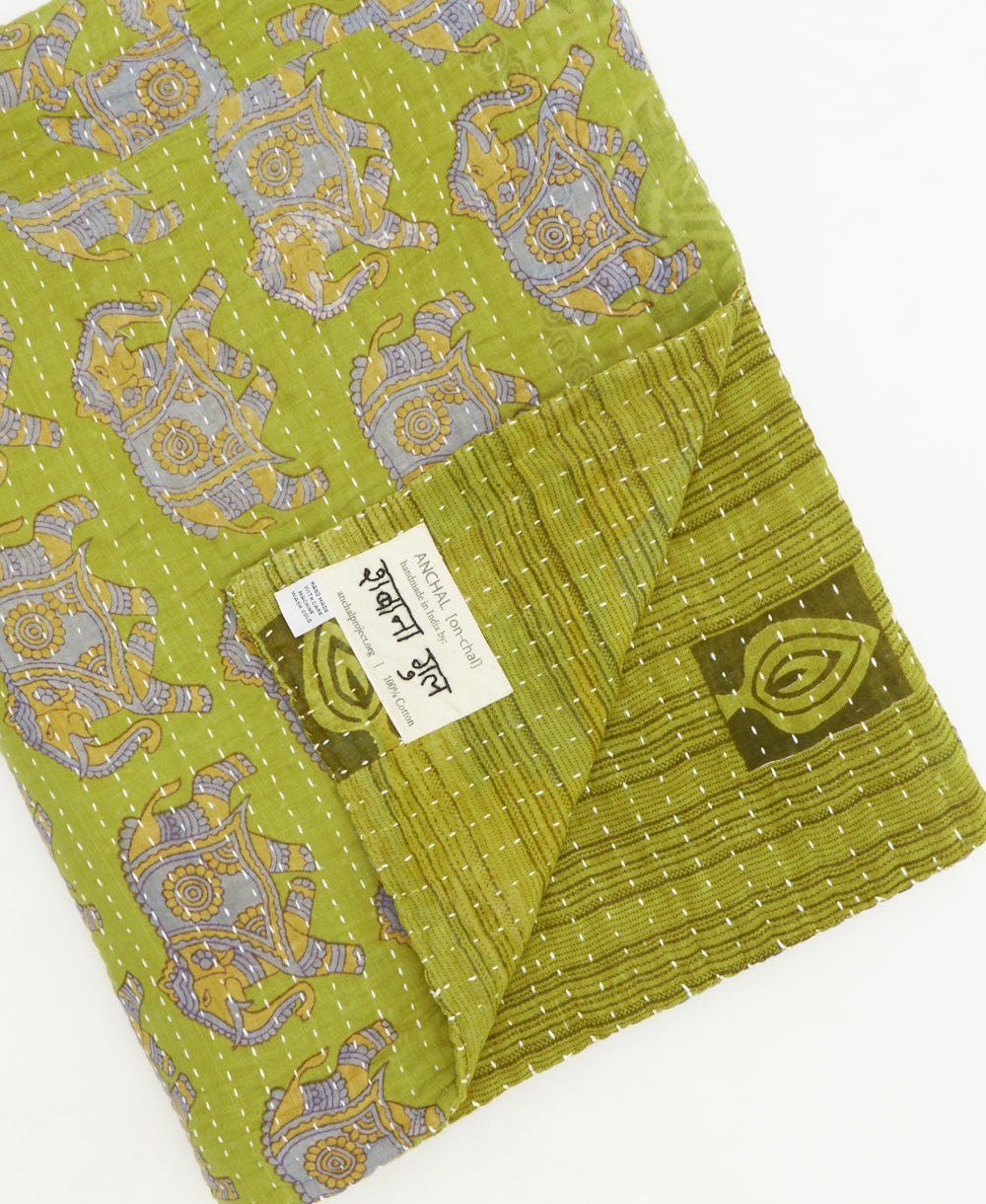 kantha quilt throw featuring traditional kantha hand stitching