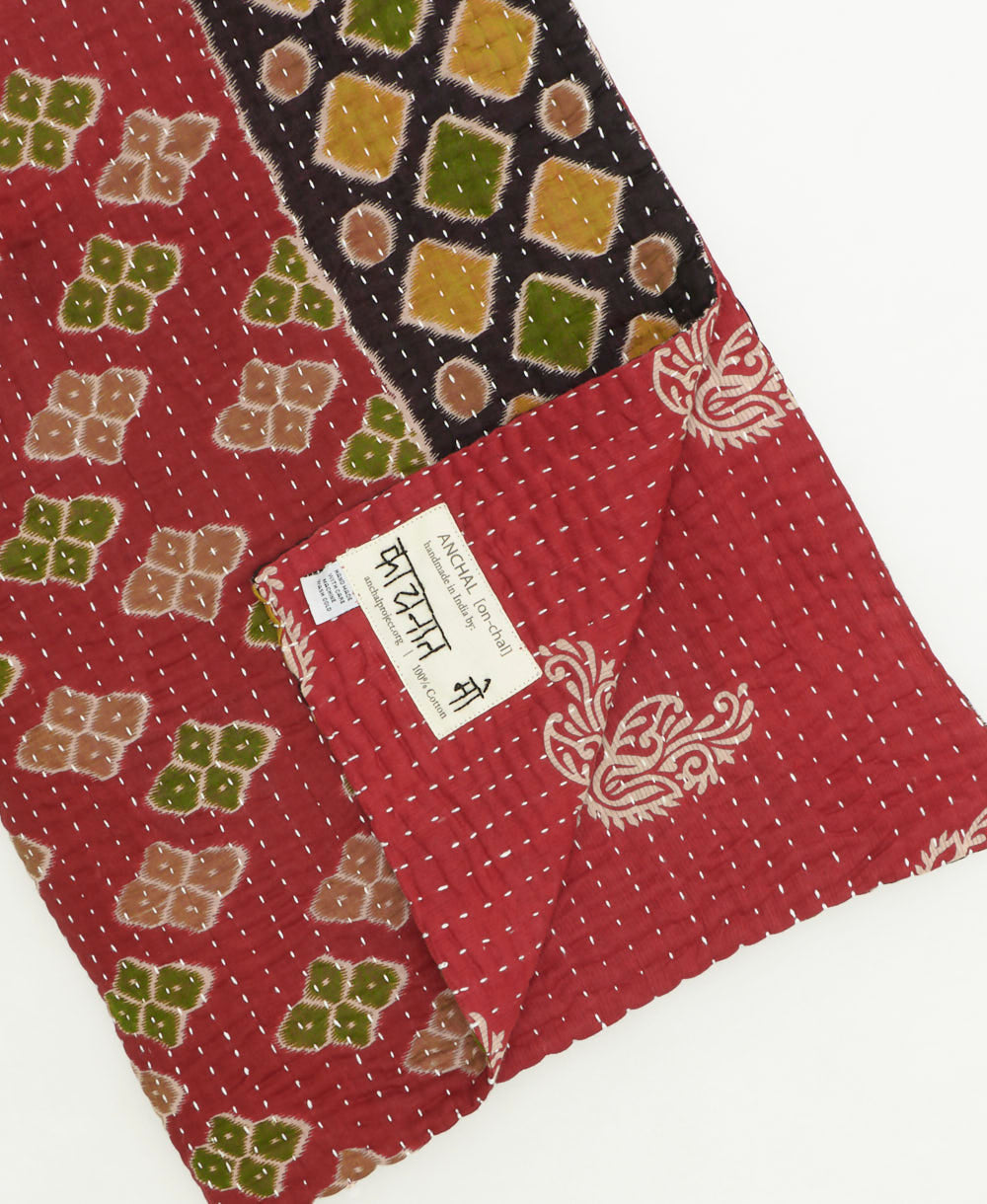 kantha quilt throw featuring traditional kantha hand stitching