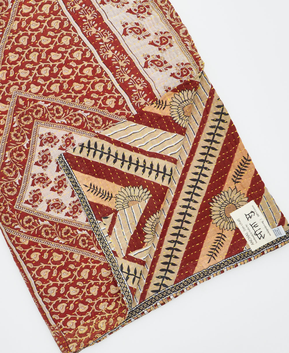 Kantha quilt throw featuring traditional kantha hand stitching