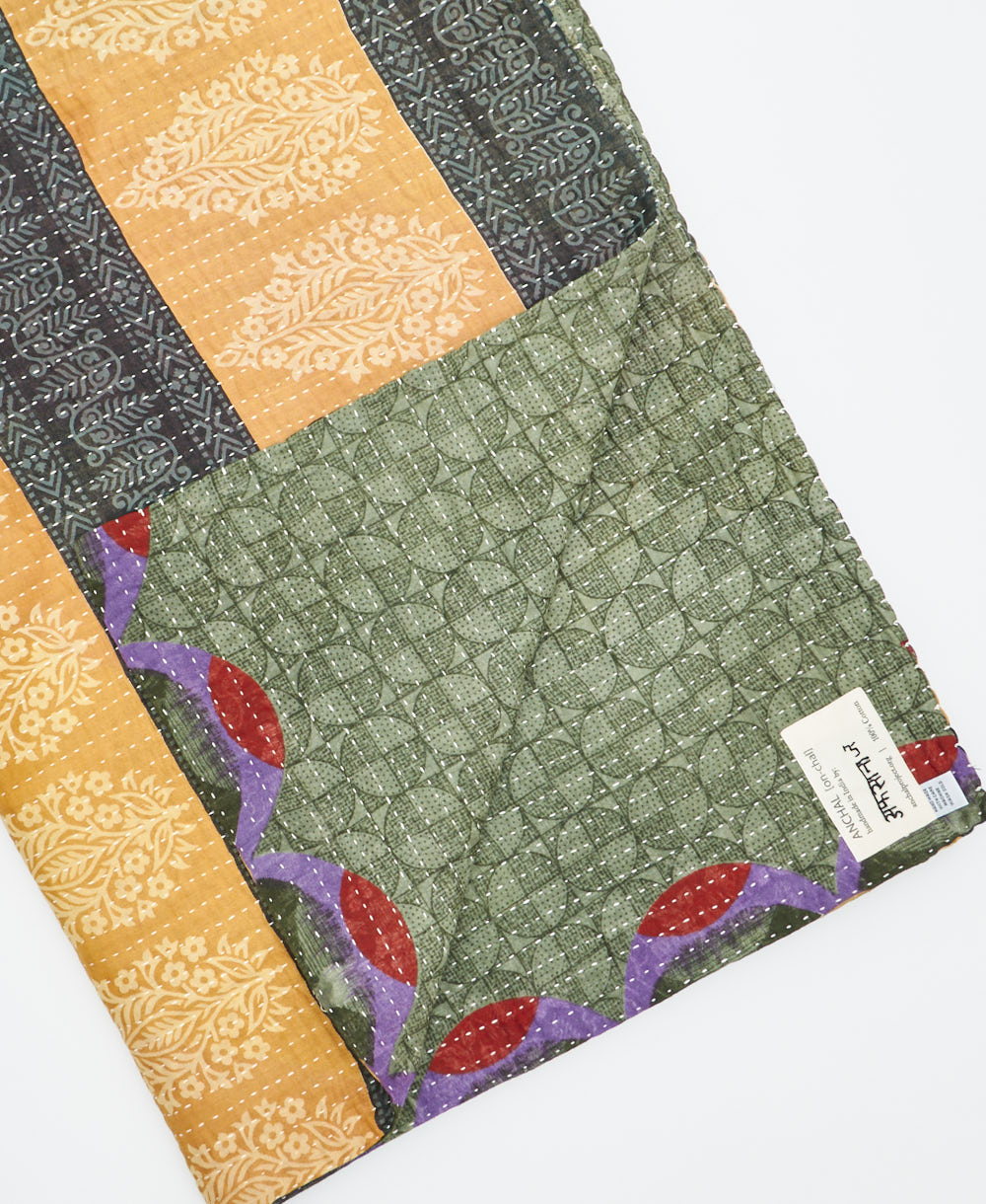 Kantha quilt throw featuring traditional kantha hand stitching