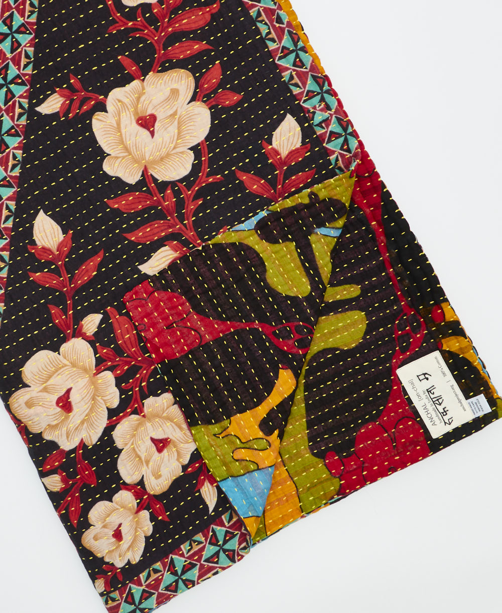 Kantha quilt throw featuring traditional kantha hand stitching