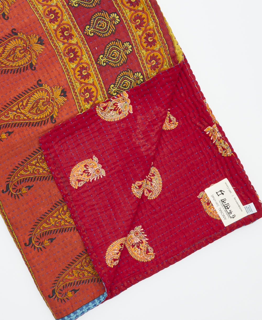 Kantha quilt throw featuring traditional kantha hand stitching