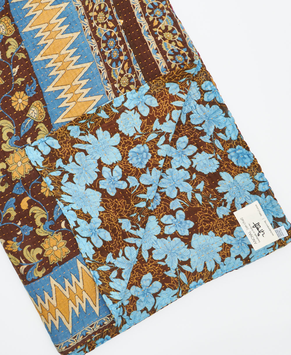 Kantha quilt throw featuring traditional kantha hand stitching