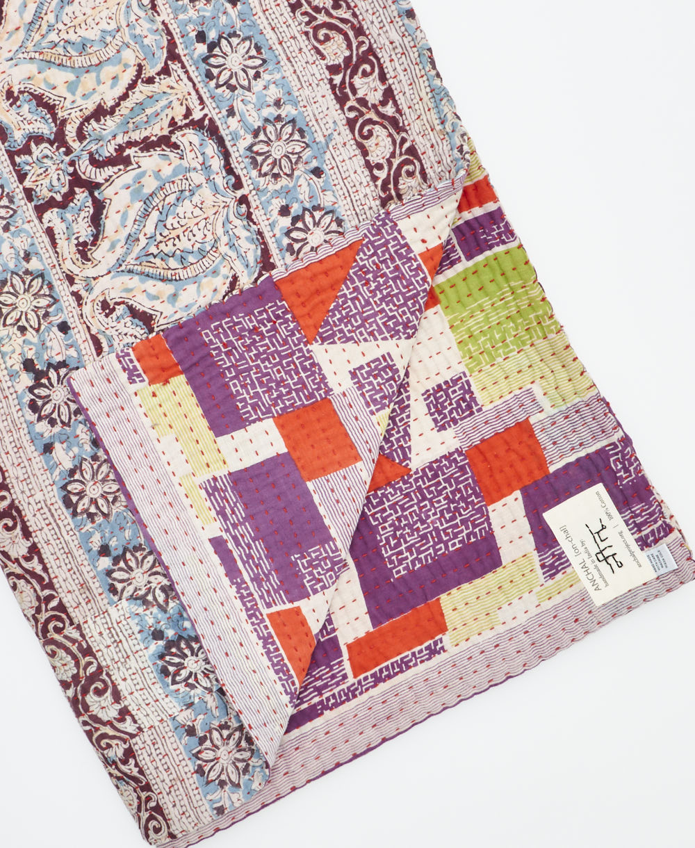 Kantha quilt throw featuring traditional kantha hand stitching