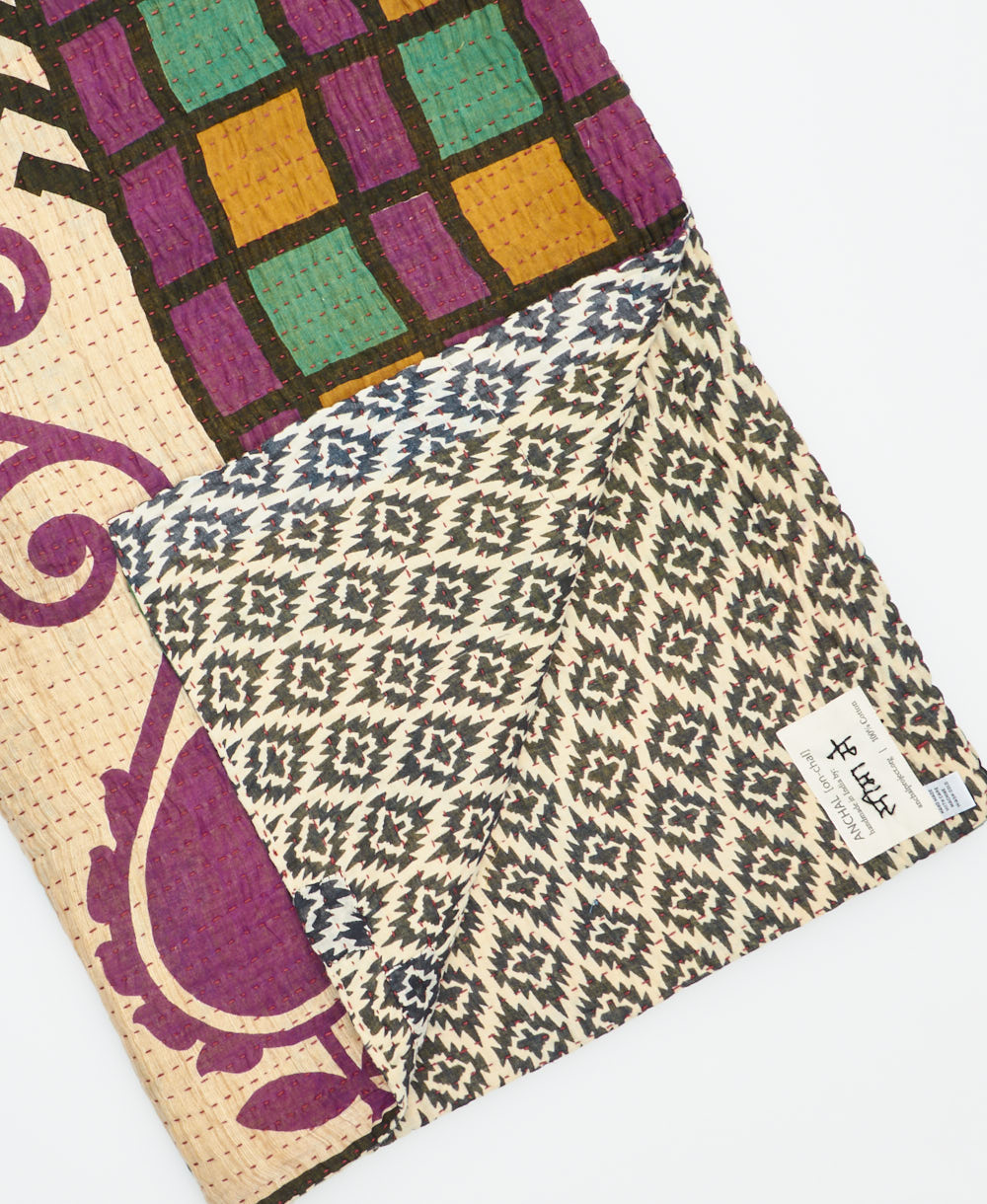 Kantha quilt throw featuring traditional kantha hand stitching