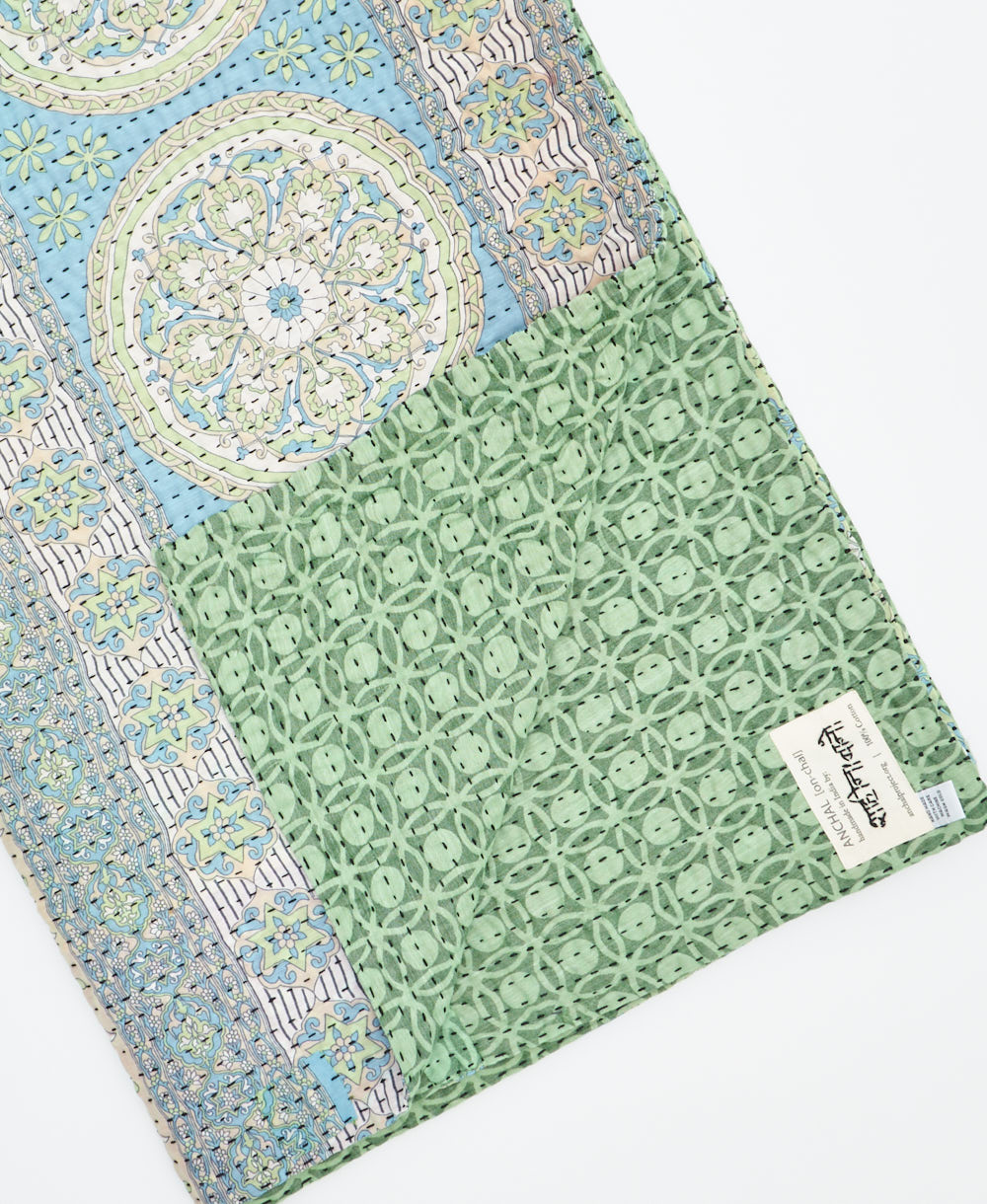 Kantha quilt throw featuring traditional kantha hand stitching