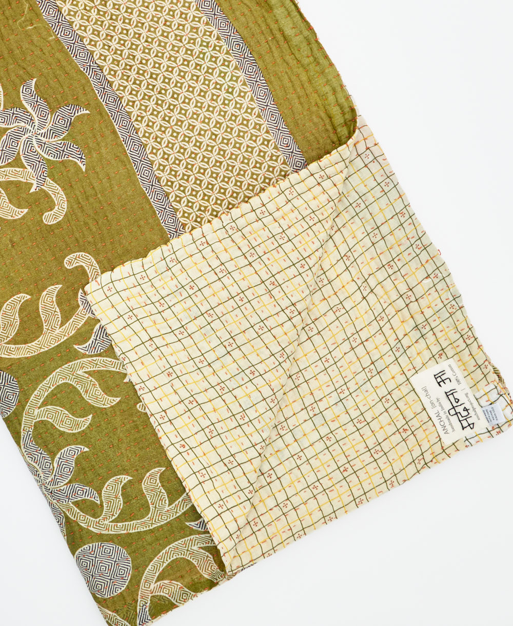 Kantha quilt throw featuring traditional kantha hand stitching