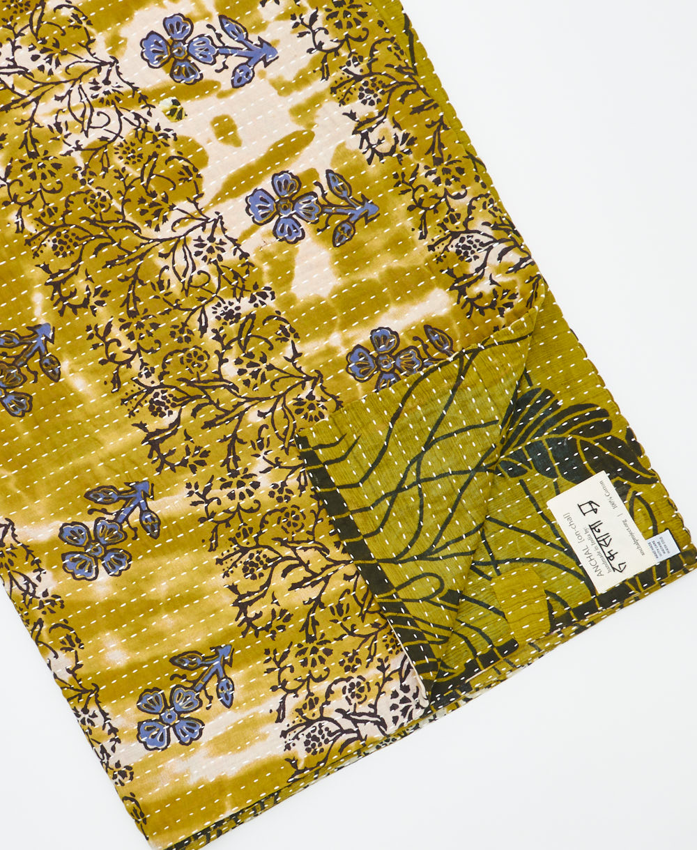 Kantha quilt throw featuring traditional kantha hand stitching