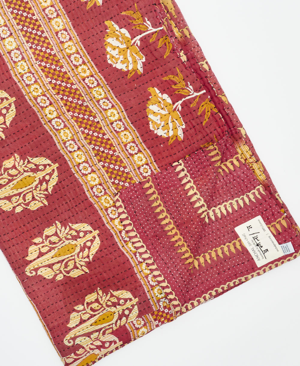 Kantha quilt throw featuring traditional kantha hand stitching