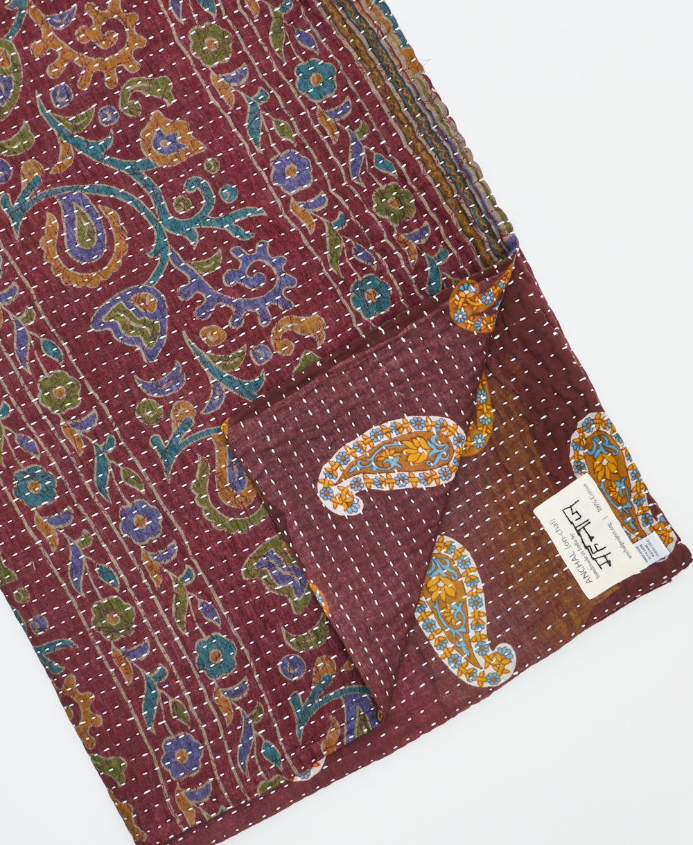 Kantha quilt throw featuring traditional kantha hand stitching