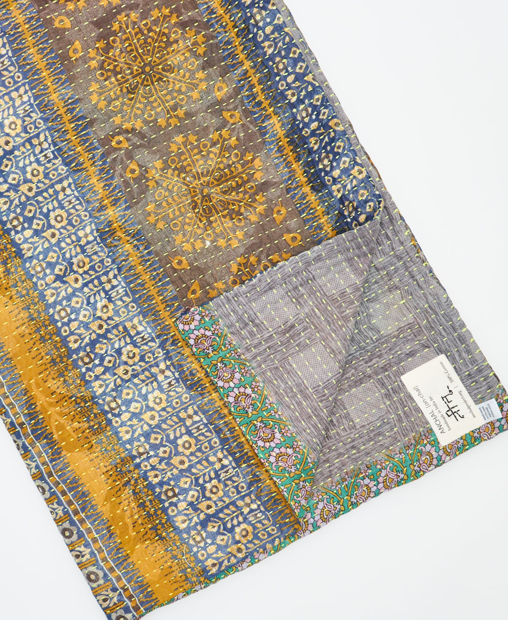 Kantha quilt throw featuring traditional kantha hand stitching