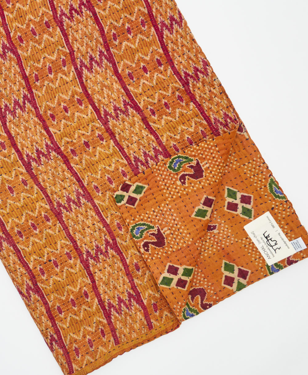 Kantha quilt throw featuring traditional kantha hand stitching