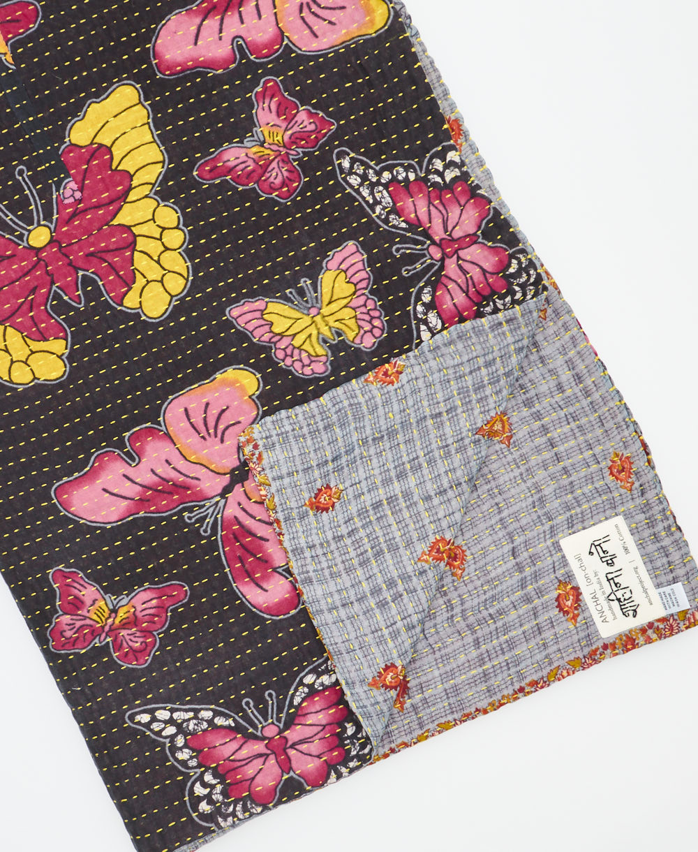 Kantha quilt throw featuring traditional kantha hand stitching