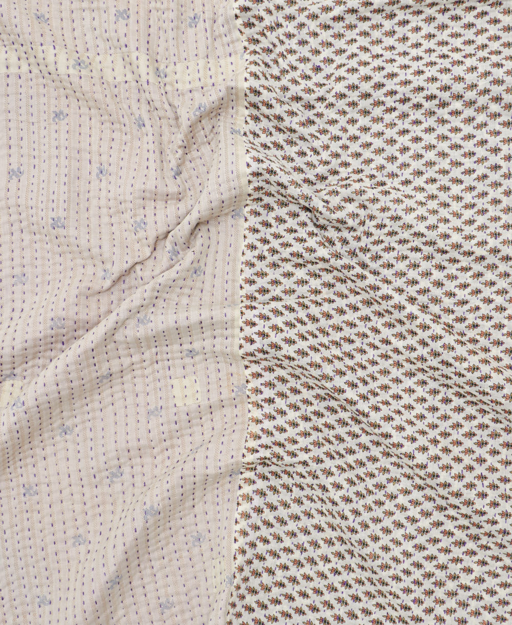 Kantha quilt throw featuring traditional kantha hand stitching