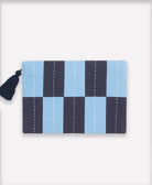Blue and navy checkered pouch with a tassel on a white background