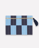Blue and navy checkered pouch with a gold zipper and black tassel on a white background