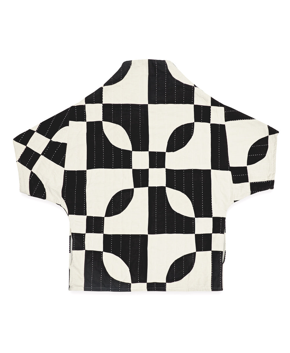 black and white organic cotton cocoon quilted jacket in bold black and white marquise print