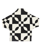 black and white organic cotton cocoon quilted jacket in bold black and white marquise print