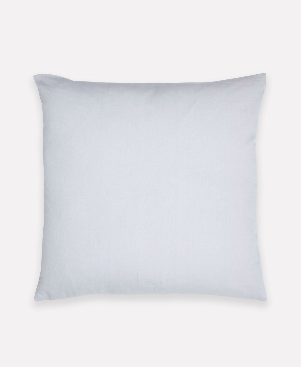 light blue pillow on a light gray background