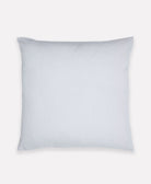 light blue pillow on a light gray background