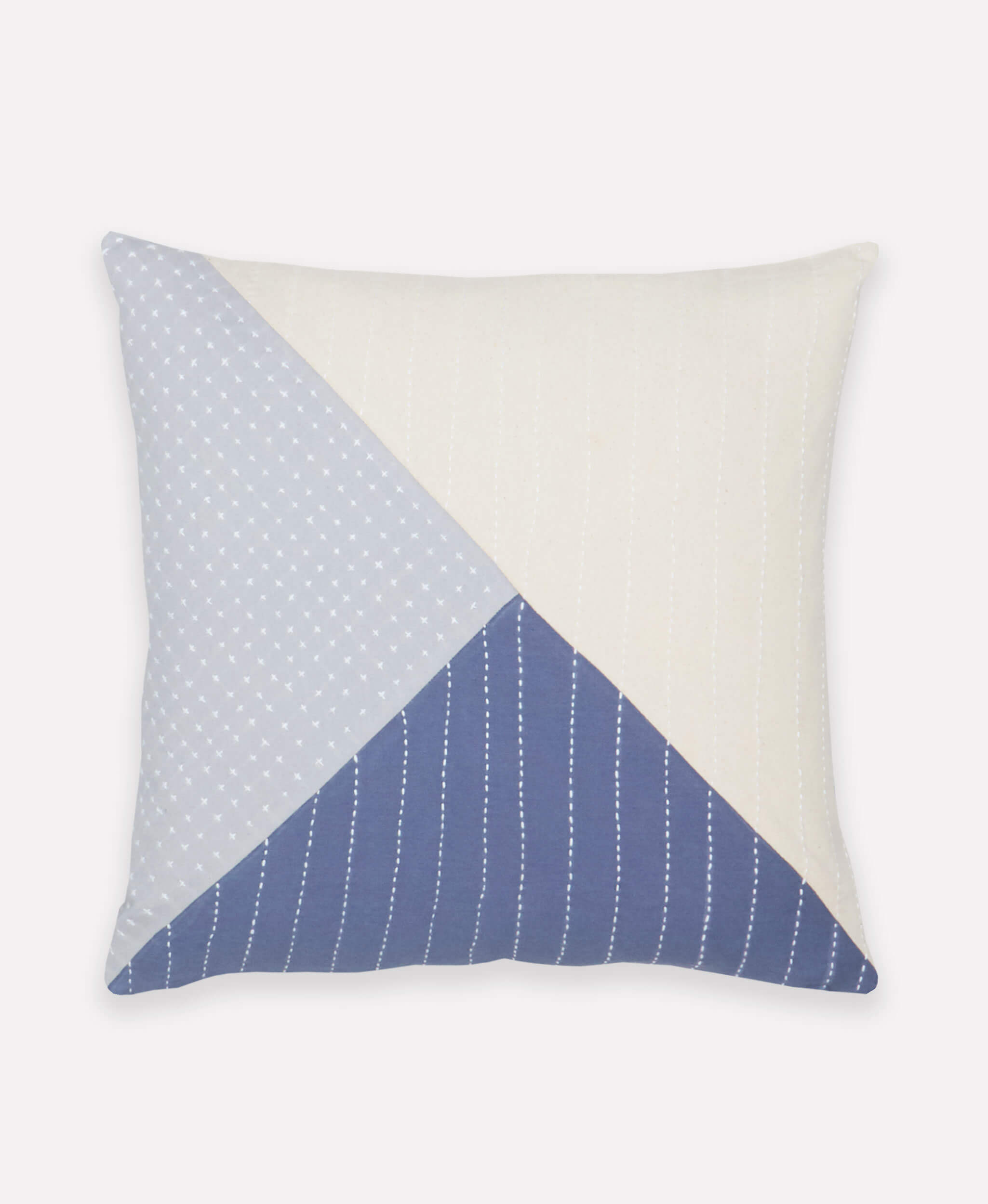 Decorative pillow with blue geometric pattern on a white background