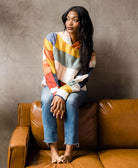 woman wearing colorblock checkered quilted hoodie handmade in India from organic cotton and AZO-free dyes