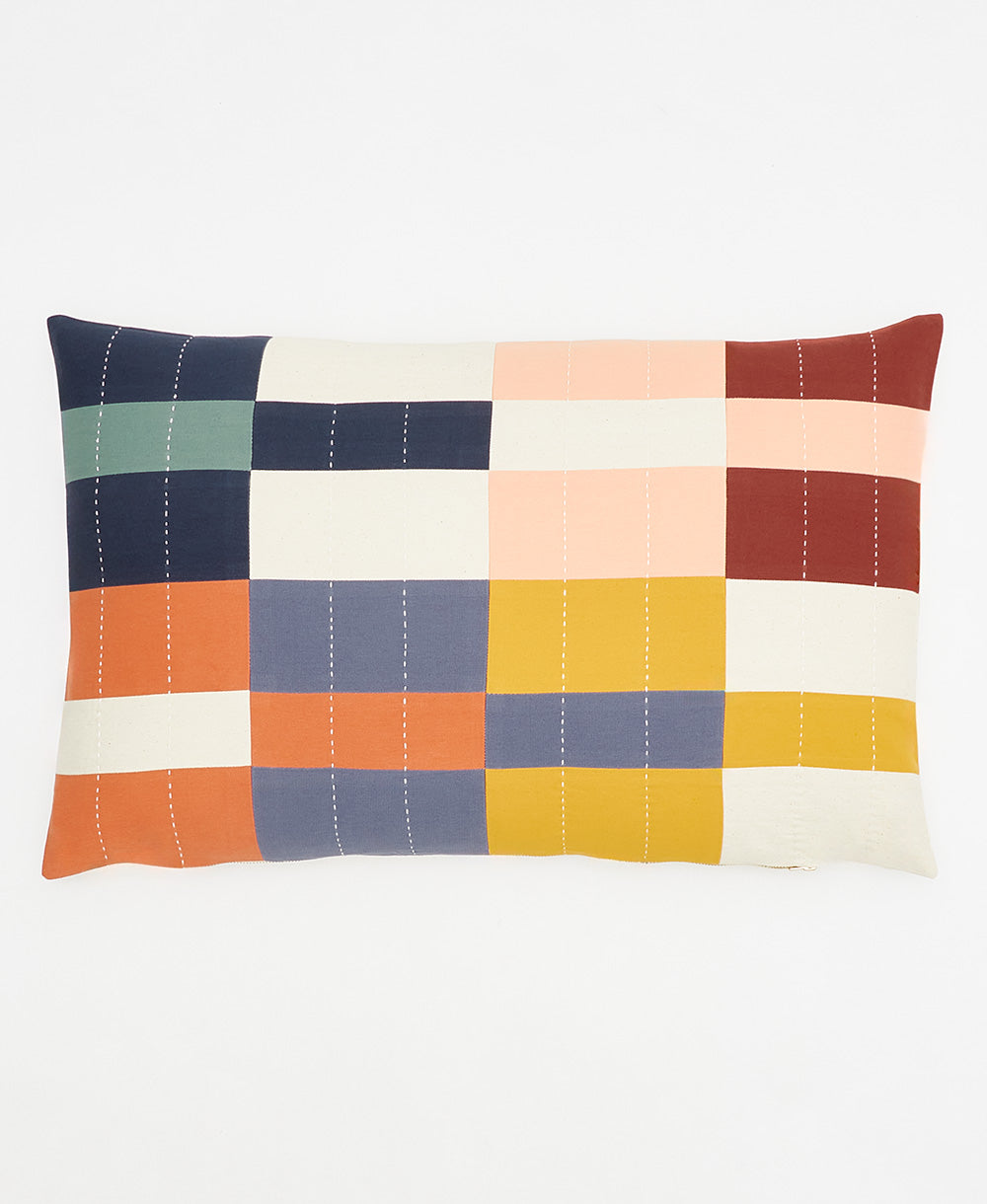 checkered lumbar throw pillow with rows of white embroidery