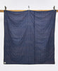 100% organic cotton quilt with reversible navy blue back and bold kantha embroidery