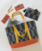 Set of fabric bags and pouches with checkered pattern on a white background