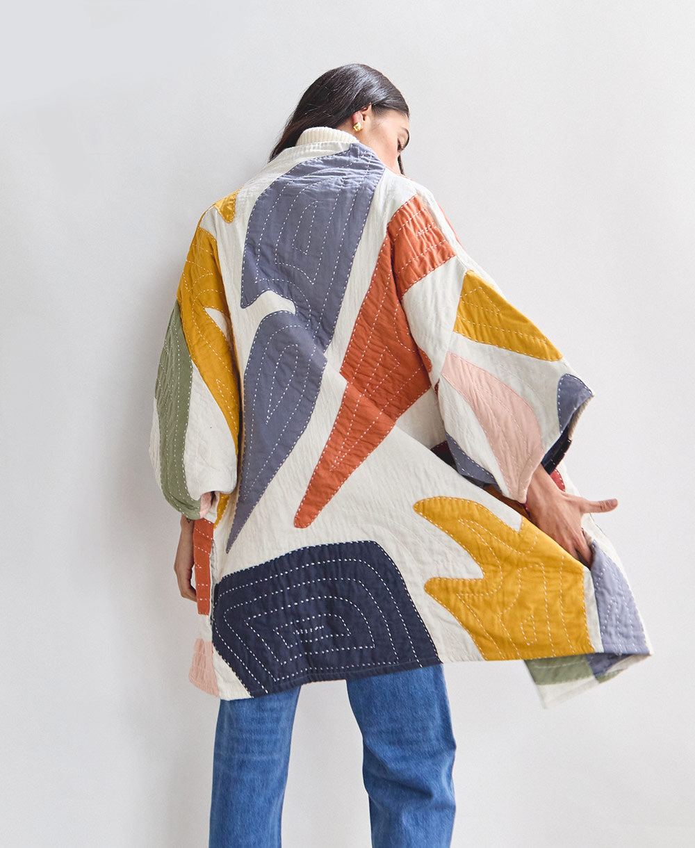 cocoon quilted jacket with colorful petal appliques made from 100% organic cotton