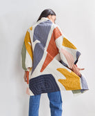 cocoon quilted jacket with colorful petal appliques made from 100% organic cotton