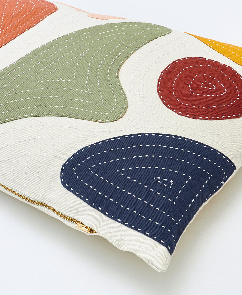 colorful petal lumbar throw pillow with brass toned metal YKK zipper closure