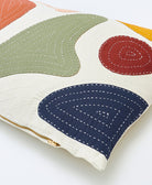 colorful petal lumbar throw pillow with brass toned metal YKK zipper closure