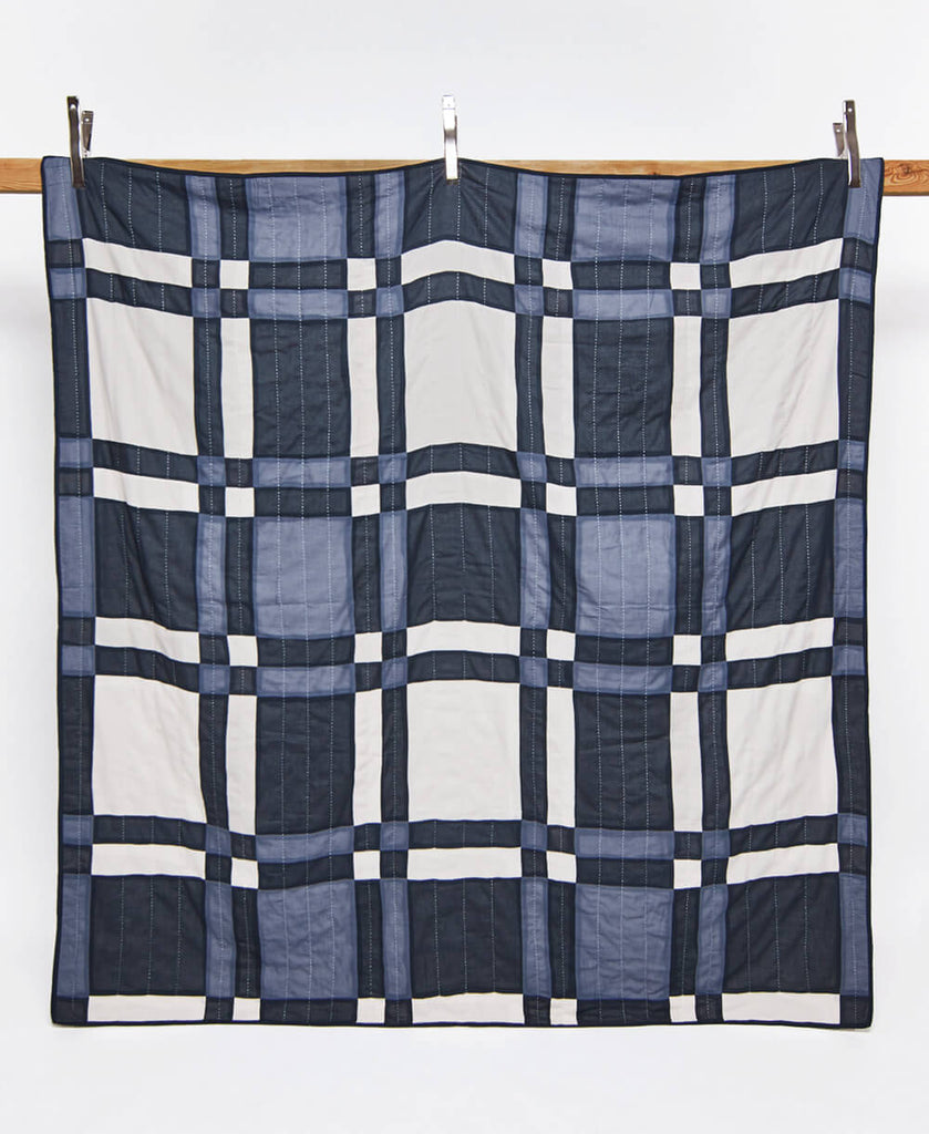 plaid patchwork quilt in navy blue and slate blue plaid