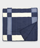 lightweight quilt made from 100% organic cotton in shades of navy blue and white