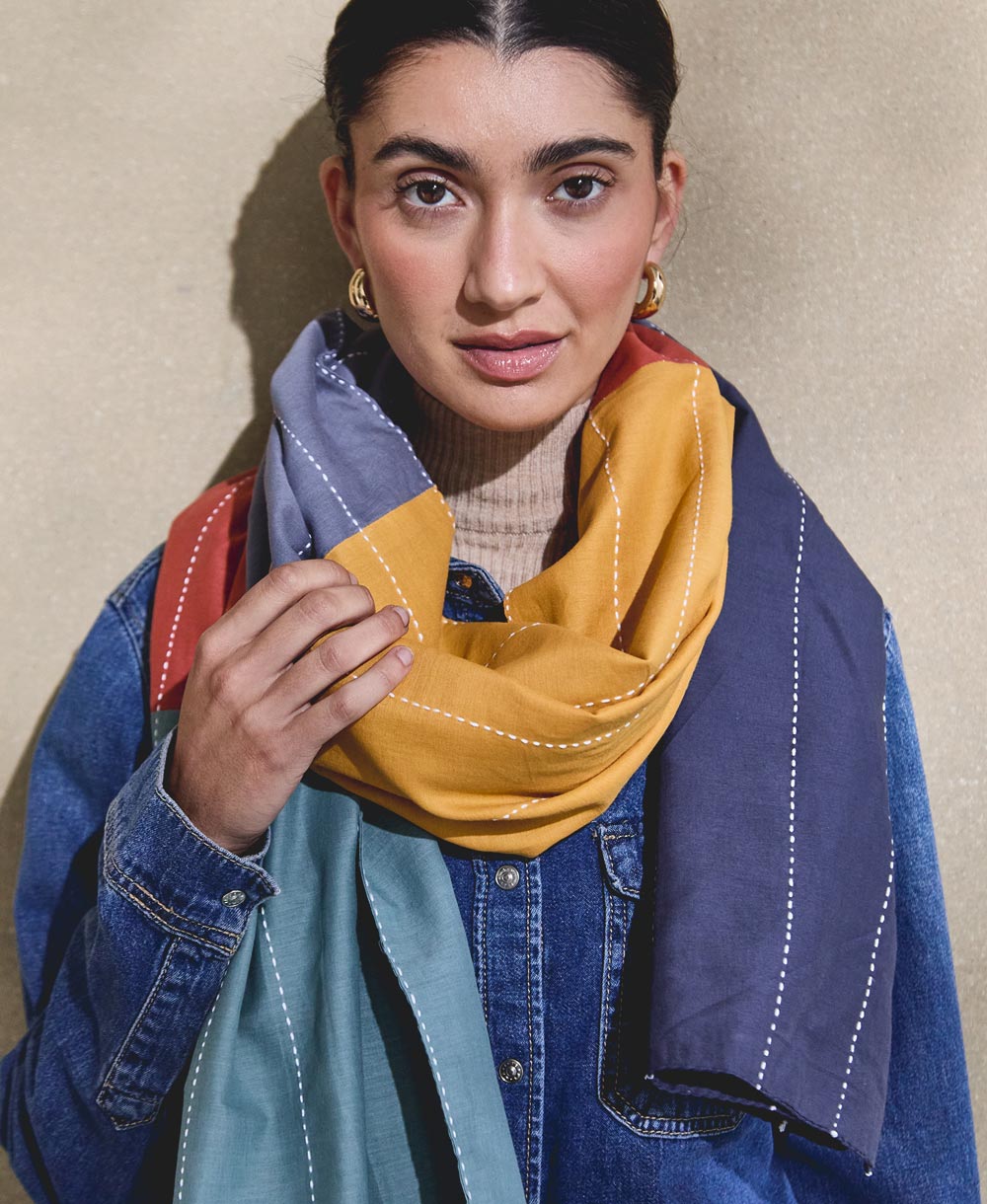 organic cotton rainbow long scarf handmade in India by women artisans and hand-embroidered with white stitching