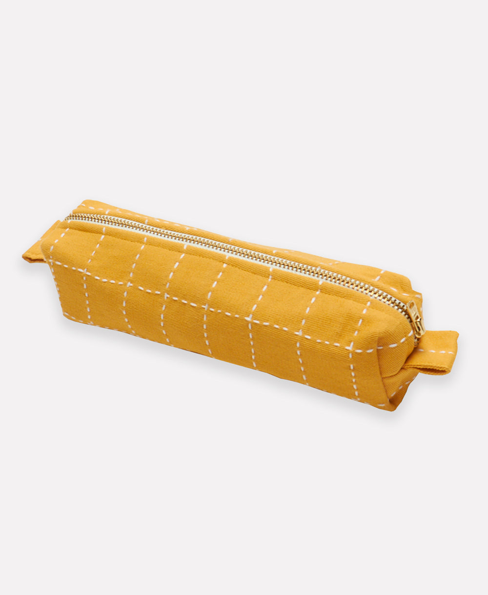 mustard yellow small toiletry bag with white embroidery