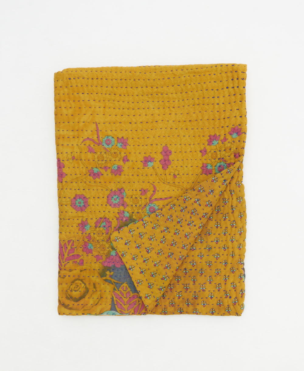 small kantha quilt handmade in India by women artisans from vintage cotton saris
