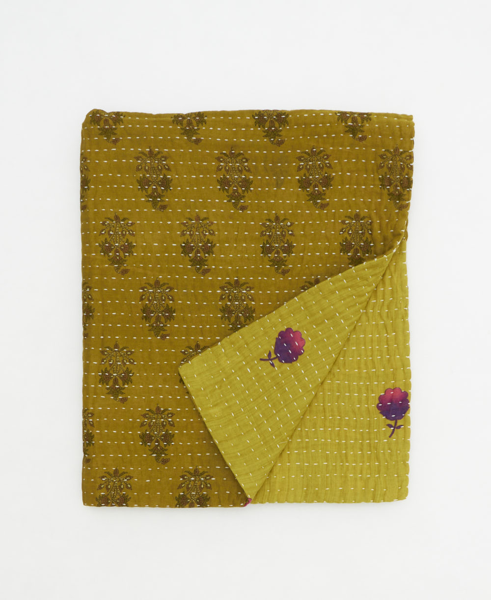 small kantha quilt handmade in India by women artisans from vintage cotton saris