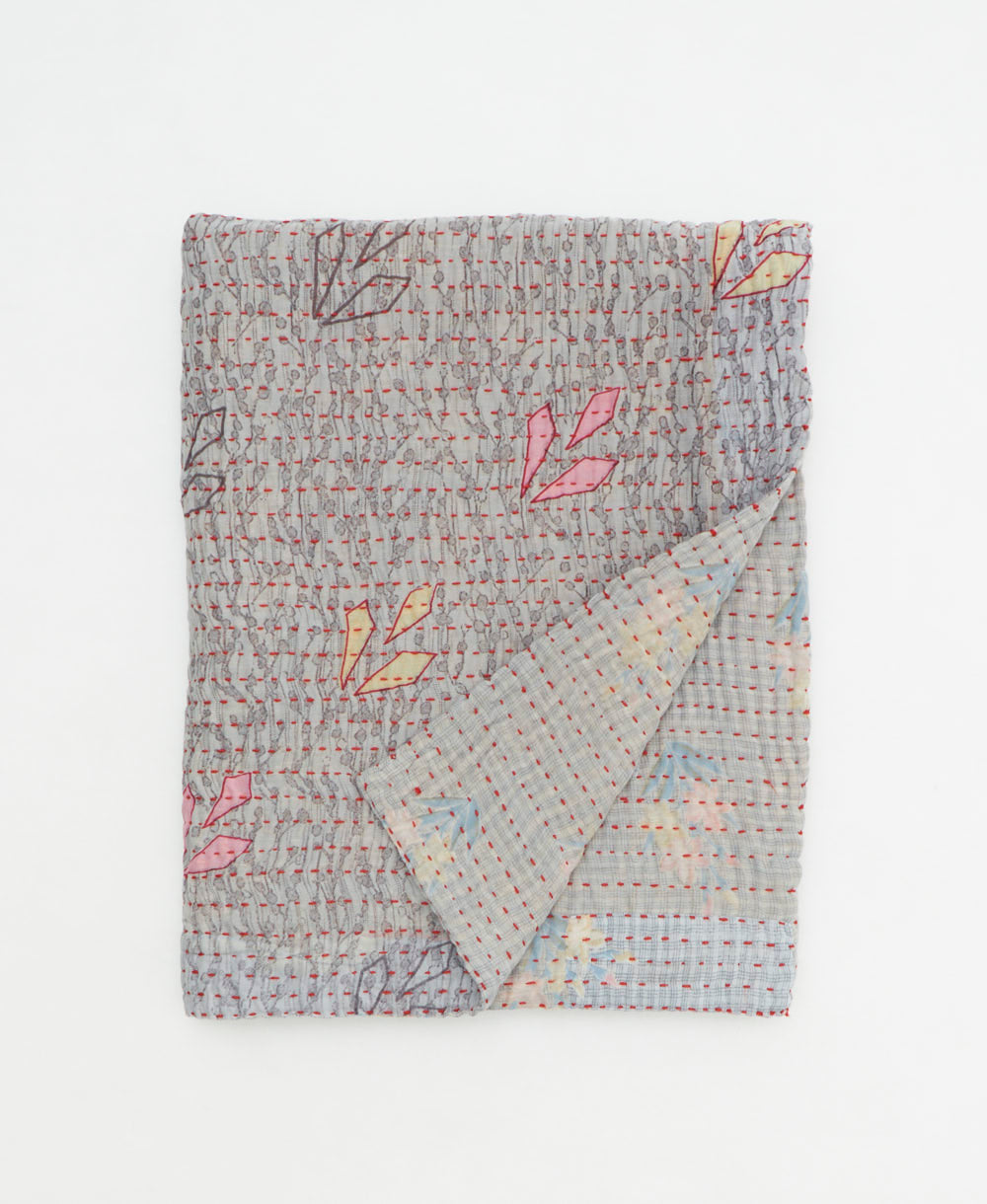 small kantha quilt handmade in India by women artisans from vintage cotton saris