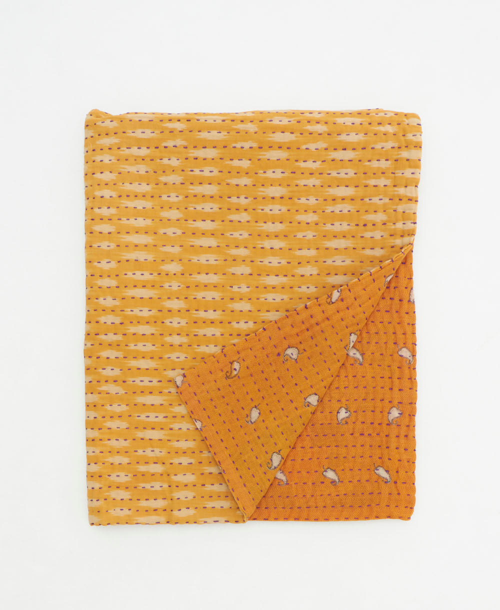 small kantha quilt handmade in India by women artisans from vintage cotton saris