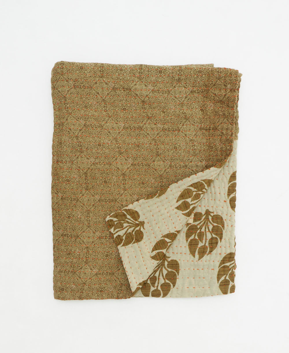 small kantha quilt handmade in India by women artisans from vintage cotton saris